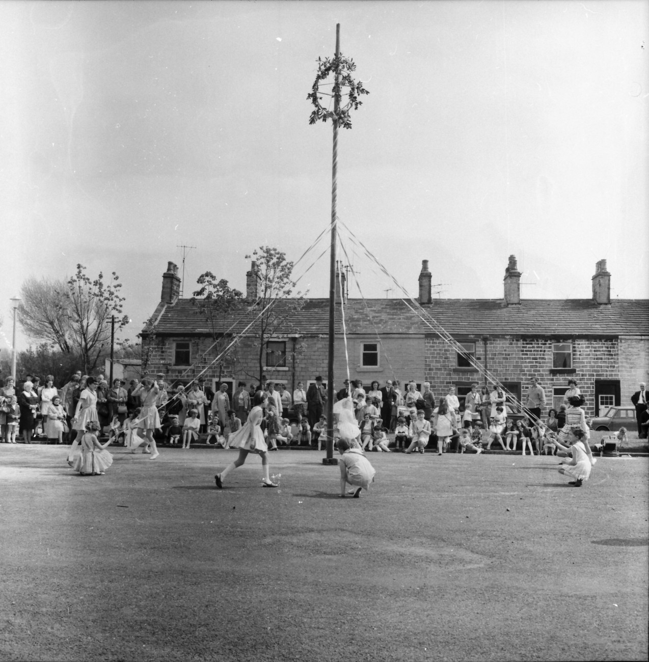 They say thanks with maypole dance