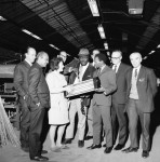 Visitors Tour Local Factories