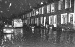 A Fire Engine and Residents Battle Through Floods