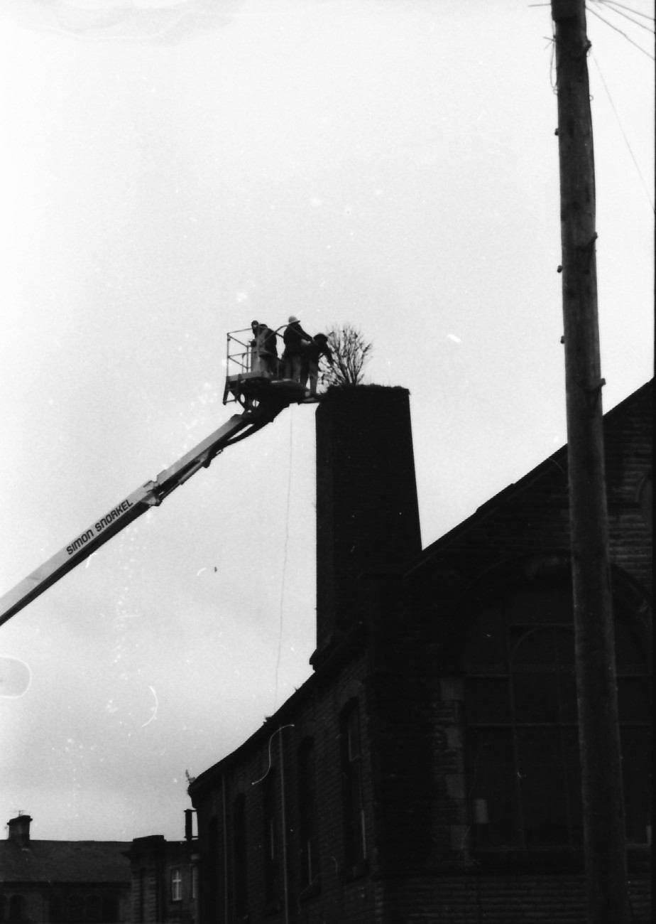 Fred does a SANTA in reverse - up the chimney instead of down.